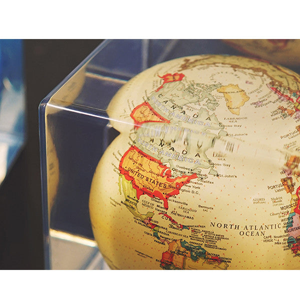 Mova Rotating Antique Beige Cube Globe - The New York Public Library Shop